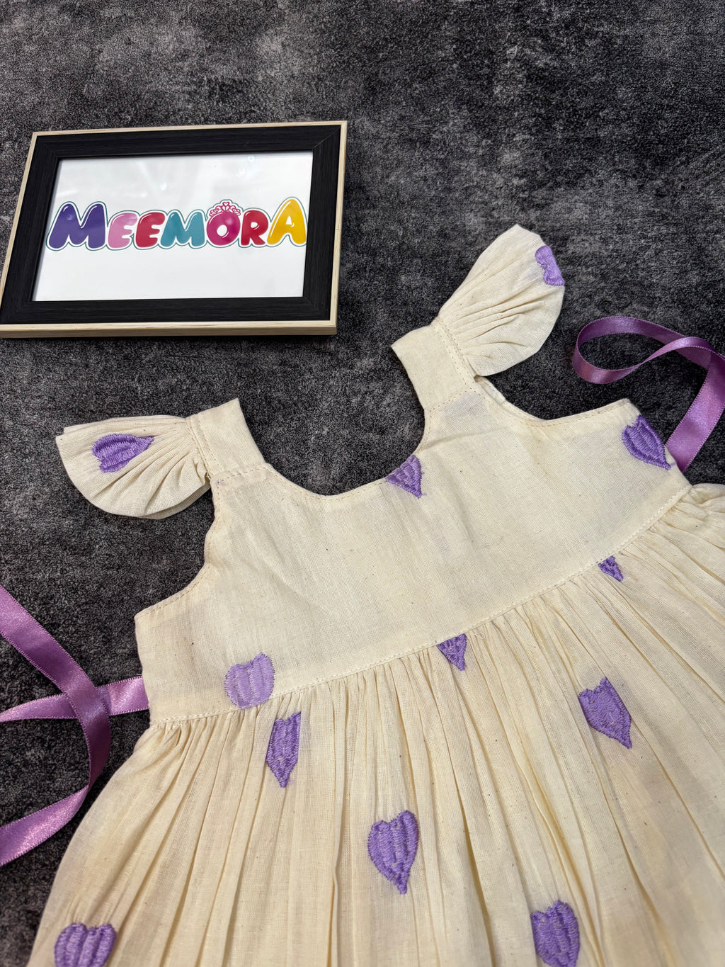 Lavender heart print mul cotton frock for baby girls - back view
