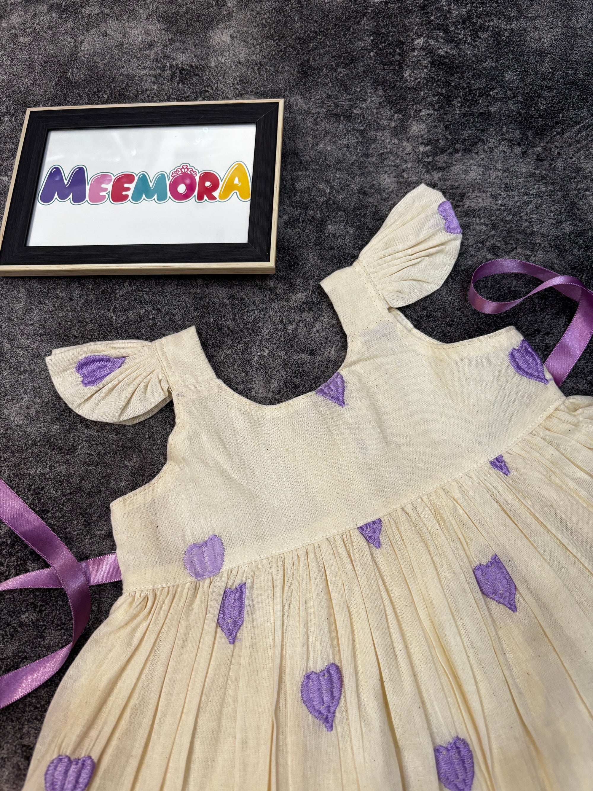 Lavender heart print mul cotton frock for baby girls - back view