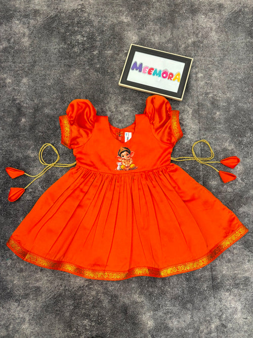 Orange Ganesha Soft Silk Frock for Girls